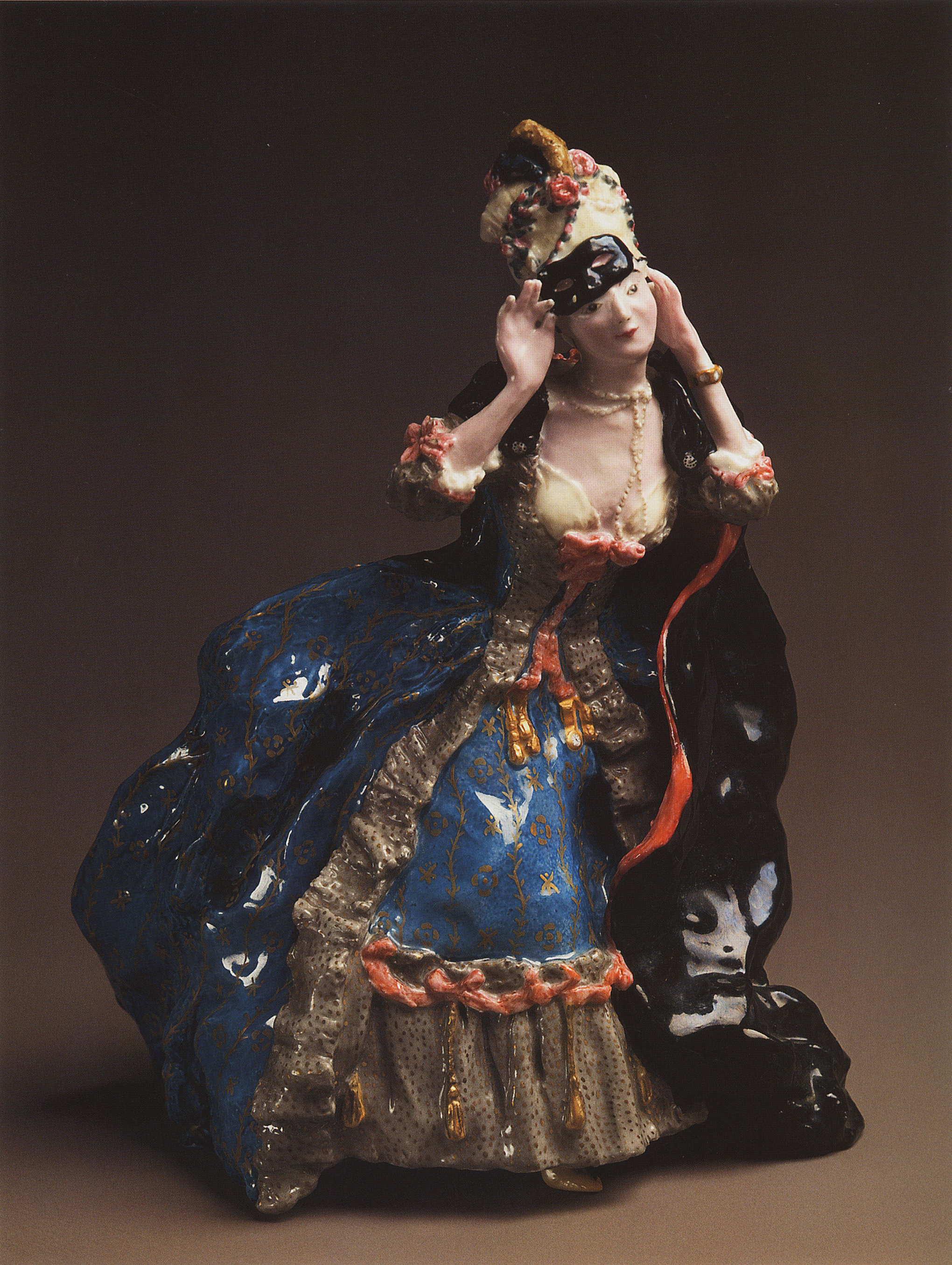 Сомов. Дама, снимающая маску. 1906
